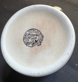Cream coloured cup or mug - South Melbourne Depot 70 years - uinderside