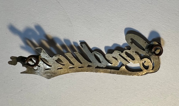 Badge - conductor by Stokes & Sons - rear