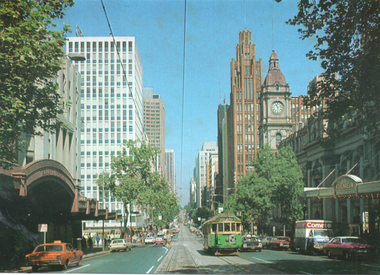 "Beautiful Collins Street" with Theatres and a tram