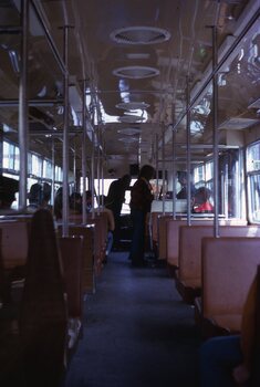 Interior photo - Ron Scholten. This photo shows the original interior when there were no strap hangers between the semi bulk heads of the two conductor booths.   