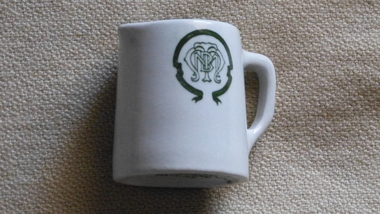 White China milk jug with MMTB logo