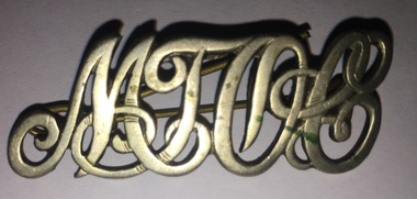 MTOCo lapel badge front