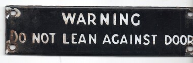 "WARNING TO NOT LEAN AGAINST DOOR".