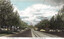 A vintage postcard view looking down St Kilda Road in Melbourne, featuring a tram, cars, and a grand building in the distance framed by trees and overhead tram wires.