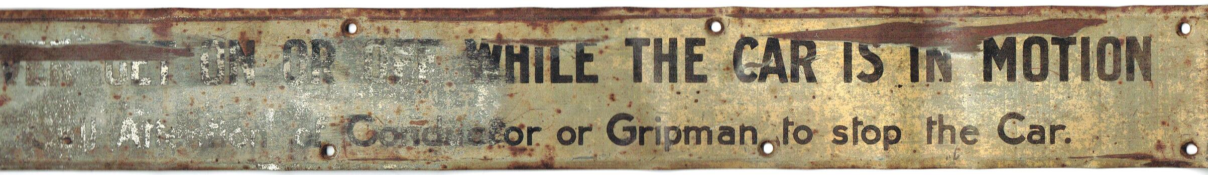 "Never get on or off while the car is in motion / Call attention of Conductor or Gripman to stop the Car."