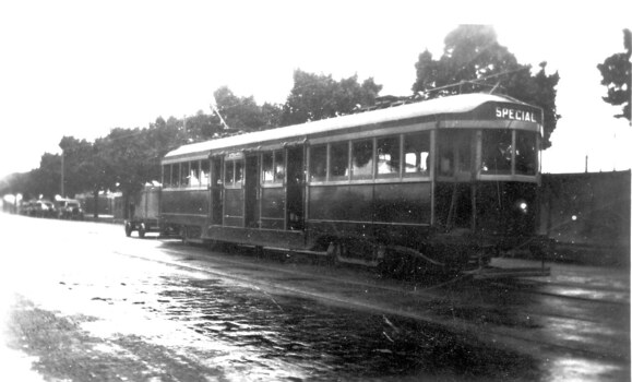 W 251 in Flinders St Melbourne towing a trailer