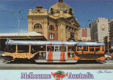 Transporting Art tram No. No. 723 with the Flinders St Station