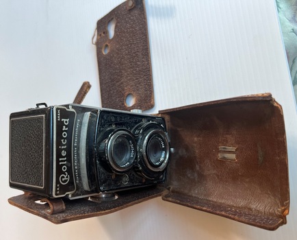 Camera with case opened showing condition