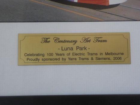 Centenial tram D2 5006 passing Luna Park - label or plaque