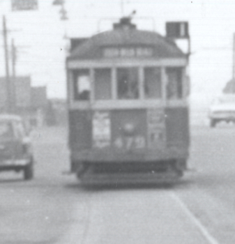 Overhead Track lighting Nicholson St Coburg - close up of tram