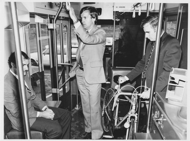 Demonstration of stowing bicycle next to conductor console in Z class tram