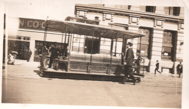 Cable tram grip car or dummy at Collins and Spencer Sts.