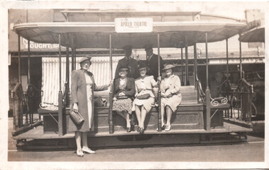 Group of four ladies on cable grip car