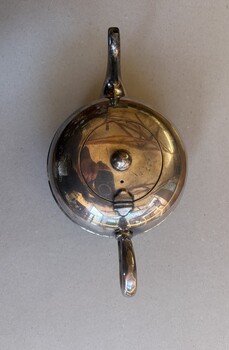 Engraved silver tea pot - plan view