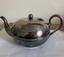 Engraved silver tea pot