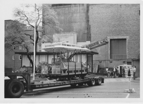 Low loader reversing into position at cnr Russell St and Little Lonsdale St