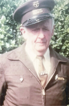 Driver Vic James in MMTB brown uniform