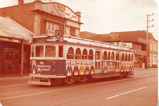 Tram W6 990 advertising Big M blueberry milk.