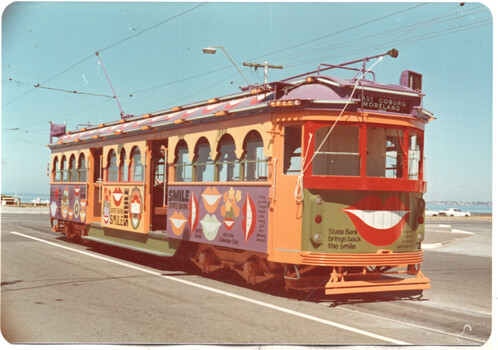 SW6 900 as the State Bank Smiles tram