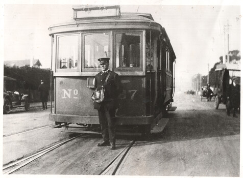MMTB tram 87 and conductor