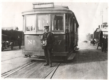 MMTB tram 87 and conductor