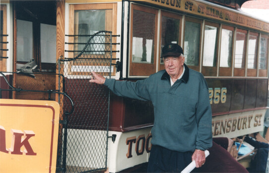 Norm Maddock standing by the trailer.