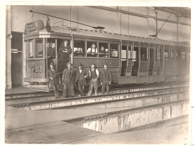 HTT tram 27 and workshop staff