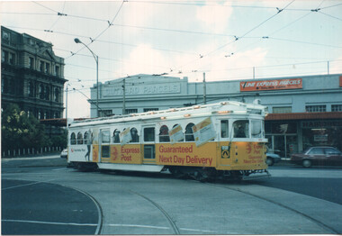 The Met tram 1018 all over-advertising Express Post - Spencer St.