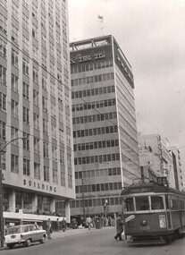 Tram 988 with Queen and Bourke St buildings