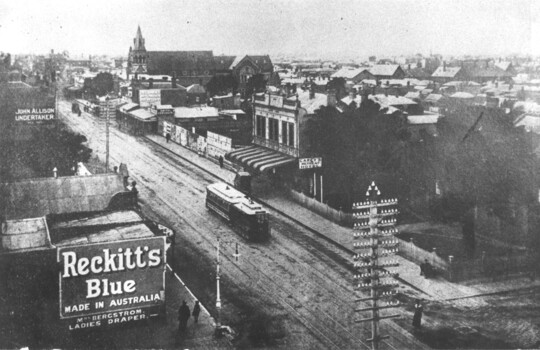 Cable tram on Sydney Road past Brunswick Town Hall.