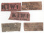 Five torn paper labels. Three labels advertise "KIWI BOOT POLISH" in large, dark lettering, with additional slogans such as "ALWAYS ASK FOR", "Most Economical The Shine Lasts", and "Unrivalled for Brillancy". The other two labels advertise alcoholic beverages: "VICTORIA BITTER" on one, and "CARLTON ALE FOSTER'S LAGER VICTORIA BITTER" on the other, with dark lettering on aged paper.