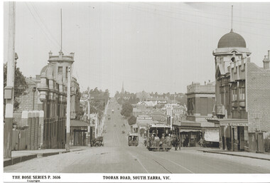Street scene of Toorak Road in South Yarra, Victoria, showing cable trams on a tree-lined road with Victorian-era buildings.
