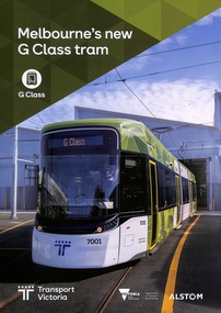 Melbourne's new G Class tram with green and white geometric livery, number 7001, parked at a depot.