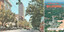 Split image: Left side shows a vintage street scene in a city with ornate buildings, trees, cars, and a tram. The right side is a postcard view of Melbourne with a large estate surrounded by trees, with the text "A Message From MELBOURNE" at the top and "PRIVATE MESSAGE INSIDE" at the bottom.