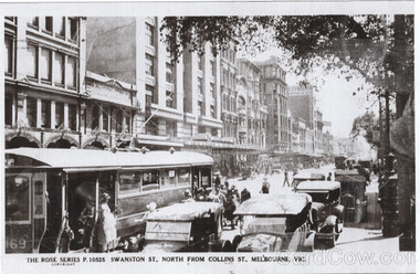A busy city street in Melbourne, Australia, circa early 20th century, with horse-drawn carts and early automobiles sharing the road with a tram.