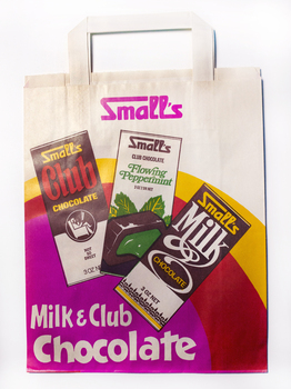 A Small's Chocolate showbag with three illustrations of chocolate packets on the front.