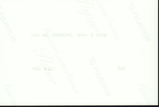 Reverse side of the photograph with printing inscription.