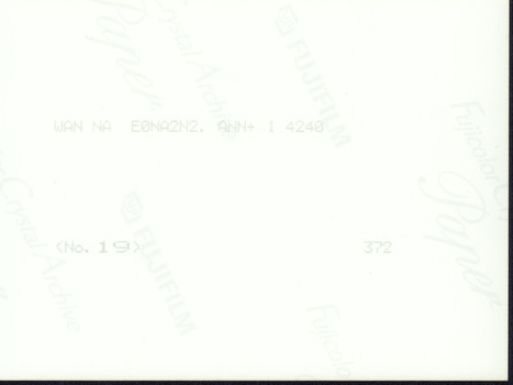 Reverse side of the photograph with printing inscription.