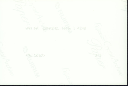 Reverse side of the photograph with printing inscription.