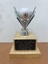 Commemorative Golf Ball: New clubhouse opening 1998. Golf ball on silver coloured mount and timber base.