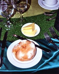 Photograph, Heidelberg Golf Club: 75th anniversary - Bread roll on table setting, 16/08/2003