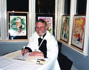 Photograph, Heidelberg Golf Club: 75th anniversary - cartoonist, 16/08/2003