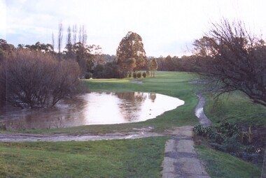 Photograph, Plenty River flooding across 2nd fairway, July 1997, July 1997