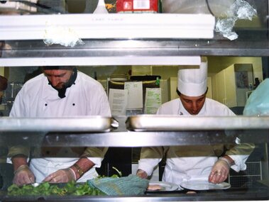 Photograph, Heidelberg Golf Club, Heidelberg Golf Club: 75th anniversary dinner - Kitchen staff preparing dinner, 16/08/2003