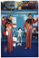 COL photo of two stiltwalers wearing colourful costumes hold hands with a skeleton on a stand. They are at a stall at the Royal Melbourne Show. The wall behind them contains the text "Have a Good Look" and "Your Life... In Your..." (partially obscured). There are some posters on the wall, one of which is titled "MINISTERIAL ADVISORY COUNCIL OF SENIOR VICTORIANS". There is also a small table with various items on it, including a book, some stickers and a water bottle. Behind one of the stiltwalkers is an A-frame sandwich board (partially obscured), with the text, "OSTEOPOROSIS VICTORIA Are you at risk of osteoporosis? ...HERE!". Two other people (partially obscured) are standing in the background.COL photo of two stiltwalers wearing colourful costumes hold hands with a skeleton on a stand. They are at a stall at the Royal Melbourne Show. The wall behind them contains the text "Have a Good Look" and "Your Life... In Your..." (partially obscured). There are some posters on the wall, one of which is titled "MINISTERIAL ADVISORY COUNCIL OF SENIOR VICTORIANS". There is also a small table with various items on it, including a book, some stickers and a water bottle. Behind one of the stiltwalkers is an A-frame sandwich board (partially obscured), with the text "...OPOROSIS TORIA... t risk ...rosis? ...ERE!" Two other people (partially obscured) are standing in the background.