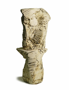 Ceramic with man's face engraved. 