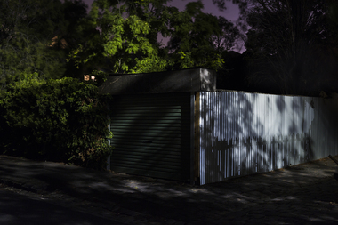 Photo of a garage at night time 