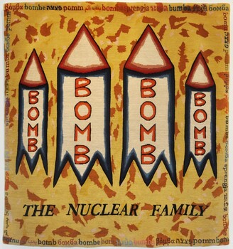 Woven rug featuring 4 bombs. 