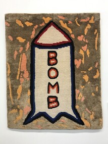 A woven rug featuring a bomb.