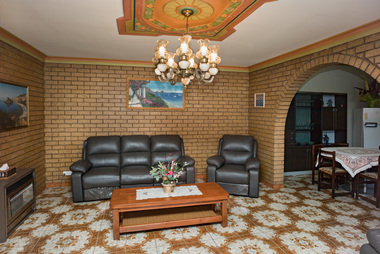 A photograph of a 1960's household interior. 